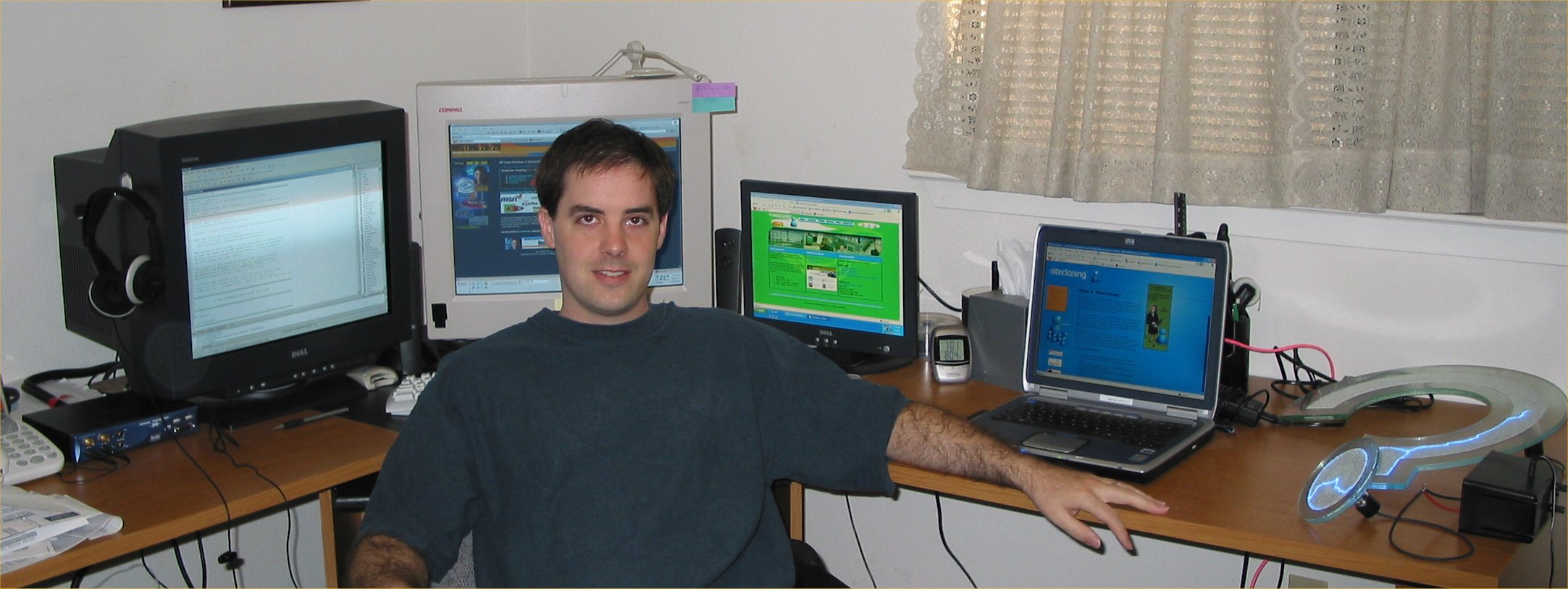 newer shot w/ my typical layout. prolly gonna ditch the 15" lcd. 3 monitors is more cumbersome than it's worth...