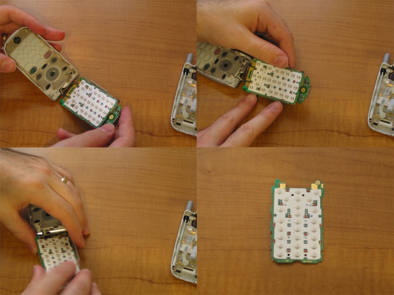 Again, do not disconnect the ribbon cable. Place more pressure where the pics show to get that white board seperated 

from the main board. You'll finally end up w/ the white board seperated from everything else. This is nifty, this is 

what we want!