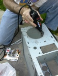 Cleaning up the 120mm fan hole. You can see the 2 60mm rear fan holes.
