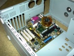 Motherboard in place (ASUS CUSL2 at the time). You can see my 'golden orb' too. It has since been replaced w/ an Alpha.