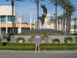 Priscilla in front of a nifty water feature there.