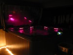 night time shot! fiber optic lights in the spa, just a little rope light around the bottom. neat effect! good idea pris!
