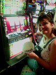 Here you see Priscilla turning the $3 of won nickles into quarters, then turning that $3 quarters into $8 of quarters in less than 5 minutes. I don't have a picture of when she lost it ALL plus another $7.50 out of her pocket! 